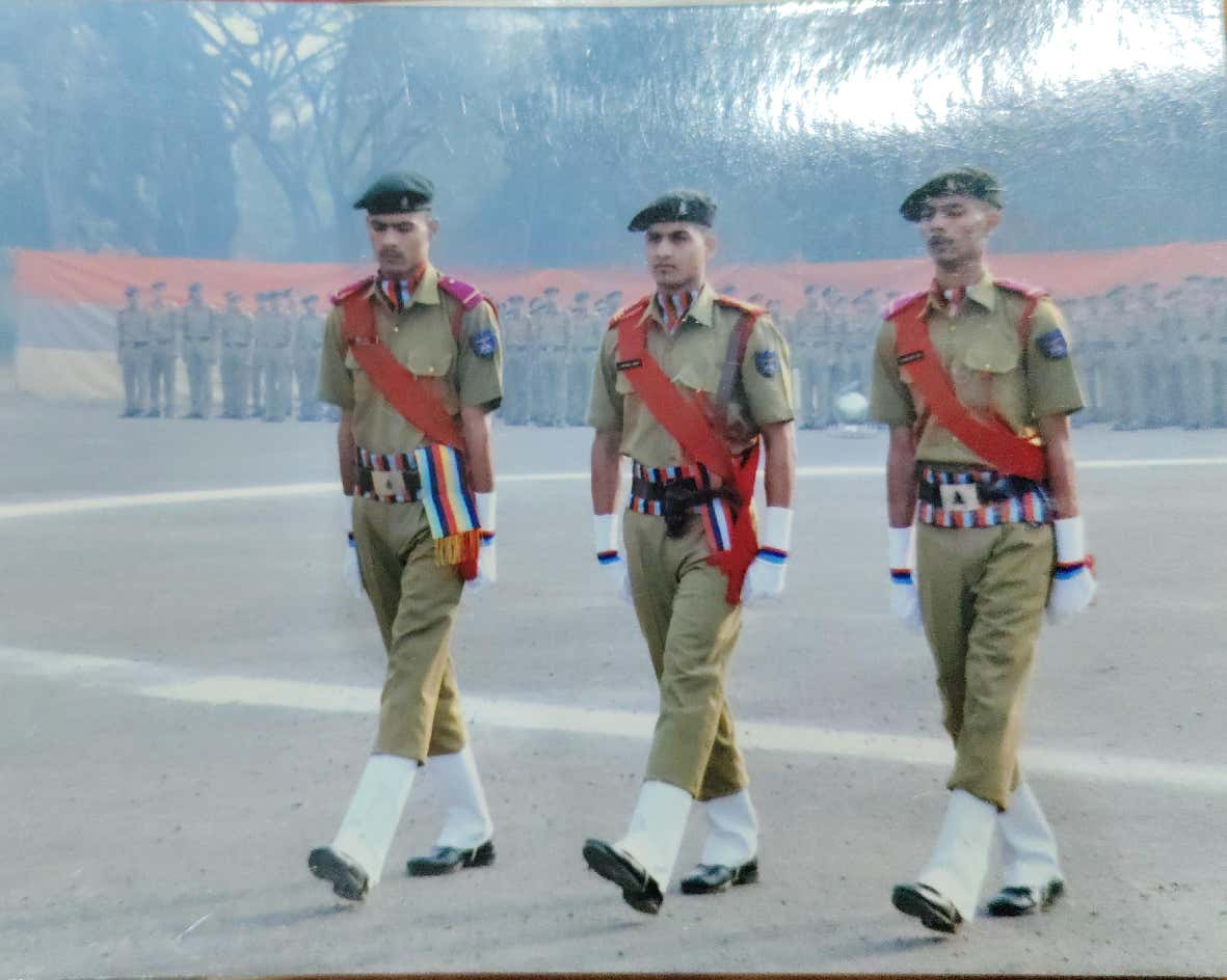 Cadets marching in ceremonial uniform on the parade ground